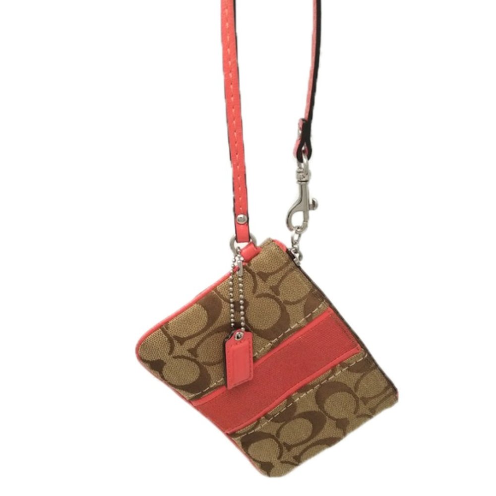 Coral and Brown Coach Signature Wristlet